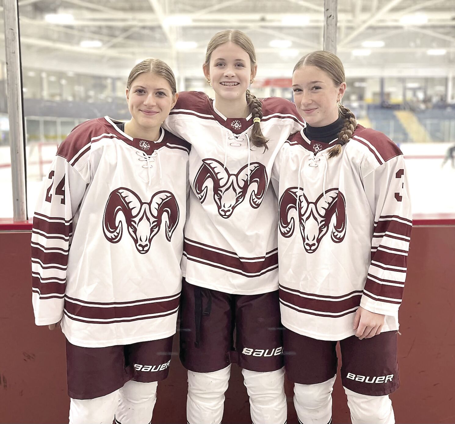 Raiders girls on cooperative hockey team